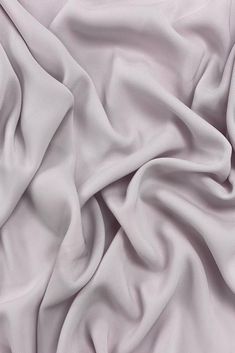 Distinguished by its luxurious design, our high-quality Rose Lilac Triacetate Lightweight Matte Crepe fabric is perfect for evening wear, skirts, blouses, pants, shirts, jackets. Originally made in Japan, this exceptionally versatile fabric is the perfect choice for your next projects. Our unique and distinctive fabric is available in a wide selection of colors. Purchase high-quality Triacetate Lightweight Matte Crepe fabric by the Yard at NY Designer Fabrics. Luxurious Design, Crepe Fabric, Chiffon Fabric, Fabric By The Yard, Evening Wear, Baby Shop, Made In Japan, Halloween Shopping, Shop House