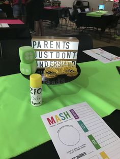 a green table topped with a sign that says parent is just don't understand