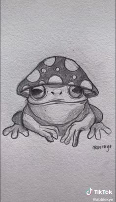 a drawing of a frog with a mushroom on it's head