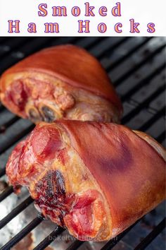 two smoked hams cooking on a grill with the words smoked ham hocks above them