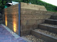 a wooden fence with steps leading up to it