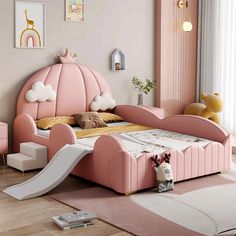 a child's bedroom with a pink bed and slide in the middle, along with other furniture