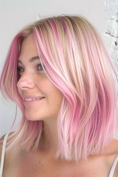 Short Blonde With Pink Highlights, Blonde Bob With Pink Highlights, Blonde With Bright Colors Fun, Short Blonde Hair Pink Highlights, Pink And Blonde Short Hair, Hair Color With Pink Highlights, Colorful Highlights In Blonde Hair, Pink Hair Ideas For Blondes, Blond Hair Pink Highlights