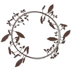 a metal circle with leaves and branches on it