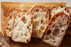 slices of bread sitting on top of a cutting board