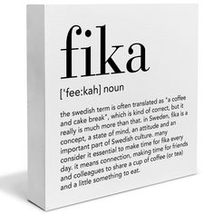 a white box with the words fika written in black on it and an image of a coffee cup next to it