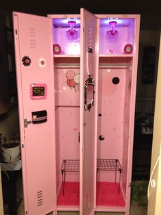 two pink lockers with lights and decorations on them