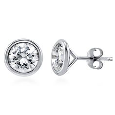 PRICES MAY VARY. 【METAL】 These stud earrings are crafted with fine real solid sterling silver, stamped 925, plated with rhodium to enhance shine and durability. 【STONE】 The dazzling solitiare stones feature 2.5 carat total (1.25ct per earring) round cubic zirconia CZ (7mm) in bezel setting. Berricle Zirconia is created in a way that truly replicates the cut, clarity and sparkle of a diamond. 【MEASUREMENTS】Earring measures 0.28"(L). Center posts with butterfly backs. These solitaire stud earrings Unique Wedding Earrings, Ring Engraving, Chalcedony Crystal, Bezel Set Earrings, Diamond Earrings Studs Round, Bracelet Tennis, Solitaire Studs, Jewelry Bridal, Gold Diamond Earrings