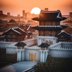 the sun is setting over an old chinese city with tall buildings and pagodas on top