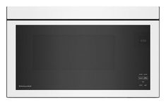 a white microwave oven with the door open and black trimming on it's side