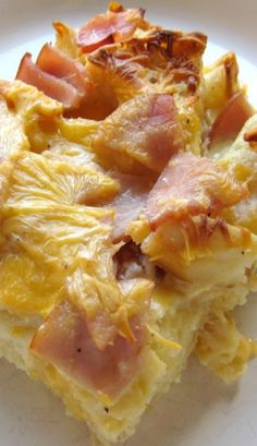 an omelet with ham and cheese on it