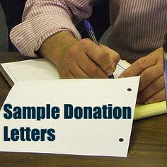 two people sitting at a table writing on a piece of paper that says sample donation letters