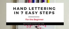 the words hand lettering in 7 easy steps for the beginner are written on lined notebooks