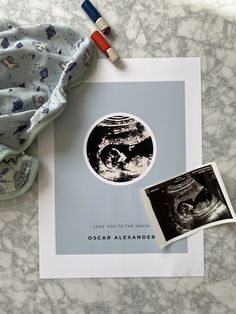 an image of the moon and baby's diaper on top of a card