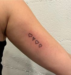 a woman's arm with the word dad written in cursive font on it