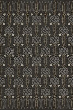 a black and brown rug with hearts on it