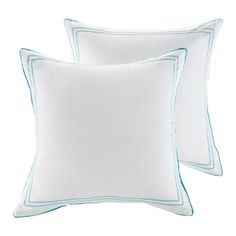 two white pillows with blue trims on them