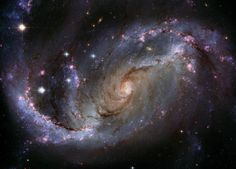 two spiral galaxy like objects in the sky