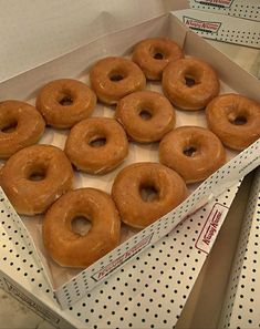 there are many glazed donuts in the box