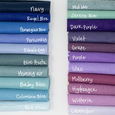 many different colors of fabric stacked on top of each other with the names of them