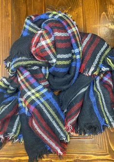 Need a soft, versatile, and warm addition to your outfit? These classic blanket scarves are perfect for any fall or winter outfit. We have three color options and they all have a gorgeous fringe edge detail. Approx. L 55" W 55" Color may vary slightly due to monitor/screen settings. Blanket Scarves, Plaid Blanket Scarf, Plaid Blanket, Blanket Scarf, Three Color, Winter Outfit, Plaid Scarf, Color Options, Winter Outfits