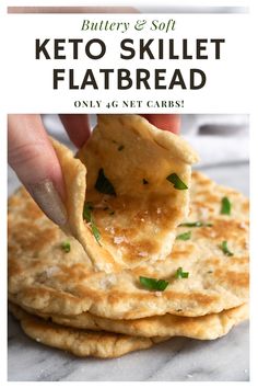 a person is holding a tortilla chip over the top of some flatbreads