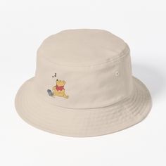 This packable, scrunchable, lightweight headwear classic is ready for adventure, from the beach to the street to the trail Breathable 100% cotton with eyelet ventilation Flat top Moderate brim is 2.2"" (5.5 cm) wide to keep the sun off your face Unstructured crown is 3.1"" (8 cm) deep Easy care: just spot clean and dry in shade. Honey bear with spilled honey and bees Honey Bear, Honey Pot, Hats For Sale, Flats Top, The Trail, Mammals, Bucket Hat, The Sun, Bee