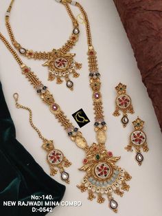 Description :- Antique Gold-Plated Indian Jewelry Set with Necklace and Earrings, Wedding Necklace, Ring Ceremony, Baby Shower Perfect for Indian weddings. All the raw material used in this product is of high quality and is handcrafted with love. Premium Quality and High craftsmanship 100% Satisfaction Guarantee: Long Lasting Plating, High-Quality Stones. Gifting: This pair of charming necklace and earrings come in a beautiful gift box, making it an ideal gift for birthday, wedding anniversary o Indian Jewelry Set, Ring Ceremony, Rings Ceremony, Indian Jewelry Sets, Necklace Ring, Box Making, Indian Weddings, Wedding Jewellery Necklace, Earrings Wedding