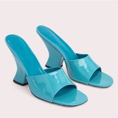 An Innovative Take On The Classic Mule, The Tais Sandal Is Made With A Geometrically Curved Heel And Completed With A Rounded Open Toe. It Is Crafted In Semi Patent Leather - A Material That Is Distinctive In By Far Collections. Blue Leather Heels With Square Toe, Summer Patent Leather Heels With Almond Toe, Blue Patent Leather Summer Heels, Blue Patent Leather Heels For Summer, Blue Synthetic Sandals With Sculpted Heel, Blue Leather Sandals With Reinforced Heel, Blue Patent Leather Evening Sandals, Blue Patent Leather Open Heel Heels, Modern Blue Open Toe Sandals