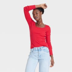 This Rib Long-Sleeve Scoop Neck T-Shirt from Universal Thread™ offers easy pairing with a range of looks. Fashioned in a fitted silhouette with a long length, this long-sleeve tee features a casual scoop neck and a ribbed construction for textured flair. The cotton material with added spandex offers a comfortable, stretchy fit. This shirt is ideal for layering or wearing on its own, plus, you can pair it with your choice of pants or shorts. Target Clothes, High Neck Tank Top, Red S, Slim Fit Shorts, Fitted Silhouette, Workout Tank Tops, Universal Thread, Long Length, Women Long Sleeve