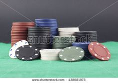 stack of poker chips on green cloth with copy space in the middle to add your own text