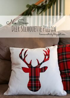 a deer pillow on a couch with the words, no sew deer silhouette pillow