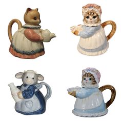 four ceramic figurines of cats and mice