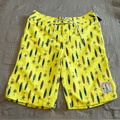 New Lucky Brand Boardshorts Boys Size 20 Yellow Surfboard Print Beach Swim New With Tags. Please See Attachment Pictures For Details And Measurements Laying Flat. Ships Quickly! Short Bottoms For Summer Beach Activities, Fun Vacation Bottoms With Built-in Shorts, Summer Bottoms For Beach Season Activities, Summer Bottoms For Beach Season, Playful Swim Trunks For Summer, Beachwear Bottoms For Summer Activities, Short Beachwear Bottoms For Summer Activities, Playful Swim Trunks For Summer Activities, Playful Short Swim Trunks For Summer Activities