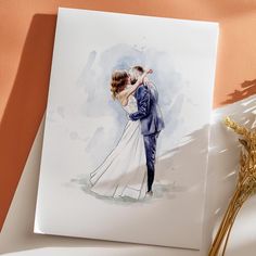 a watercolor painting of a bride and groom kissing on their wedding day, with dried flowers in the foreground