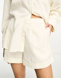 Pretty Lavish boxy shorts with pockets in cream - part of a set | ASOS Relaxed Fit Cotton Sets With Short Length, Short Cotton Sets With Pockets, Cotton Sets With Pockets And Short Length, Loungewear Sets With Built-in Shorts, Summer Short Sets With Pockets, Summer Sets With Pockets And Short Length, Casual Short Sets With Pockets, Beige Relaxed Fit Shorts With Elastic Waistband, Beige Summer Sets With Pockets