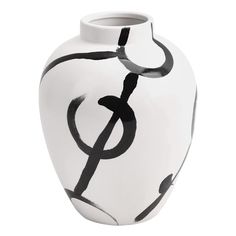 a black and white vase sitting on top of a table