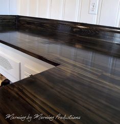 a kitchen counter top with an oven in the middle