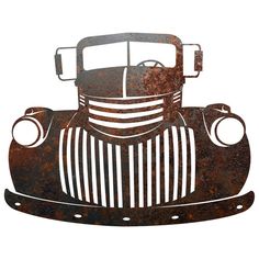 an old fashioned car is shown in the shape of a wall hanging ornament