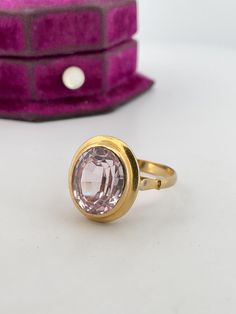 Welcome to Caviar and Cobwebs ! Thanks for stopping by. Enjoy browsing!  Here we have a lovely vintage  lab grown 4ct pink Sapphire ring. Crafted from 18k yellow gold, marked and tested. This ring is in a size 7.75. The face of the ring measures approximately 15.5mm x. 14.5mm with a 2.5mm wide band. Great addition to any collection. Beautiful pink hue, slight wear due to age.  Gift wrapped and shipped safe and secure from Canada. Box for display purposes only* Gold Pink Sapphire Ring With Bezel Setting, Pink Sapphire Ring With Bezel Setting In 14k Gold, Luxury Pink Sapphire Ring With Bezel Setting, Heirloom Pink Sapphire Jewelry With Prong Setting, Luxury Hallmarked Pink Sapphire Ring, Pink Sapphire Ring, 18k Yellow Gold Ring, Wide Bands, Pink Sapphire