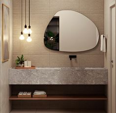 a bathroom with a sink, mirror and lights