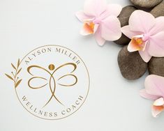 pink orchids and brown rocks with the logo for willow miller wellness coach on it