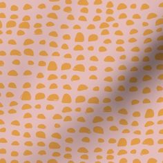 an orange and white wallpaper with small circles on it's back drop shadow