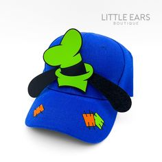 a blue hat with an image of a frog on it's front and back