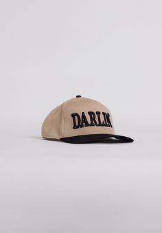 3D Embroidered "DARLIN'" Mid profile snapback Adjustable snapback closure One size fits most Structured Firm Front Panel 65% Polyester 35%Cotton Toddler Boots, Boys Bottoms, Wardrobe Inspiration, Boys Pajamas, Black Hat, Black Khakis, Style Statement, Mens Fragrance, Kids Tops