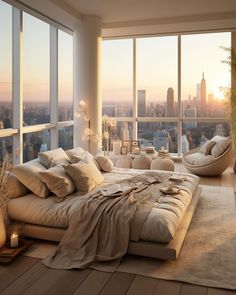 a large bed sitting in the middle of a living room next to tall windows with city view