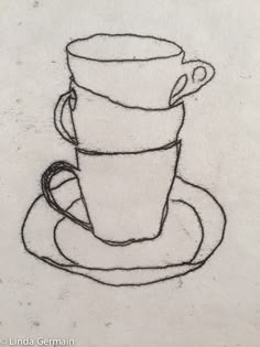 a drawing of two coffee cups stacked on top of each other