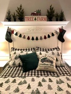 a bed with christmas decorations on the headboard