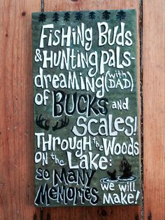 a sign that is on the side of a wooden door saying fishing buds and hunting pals