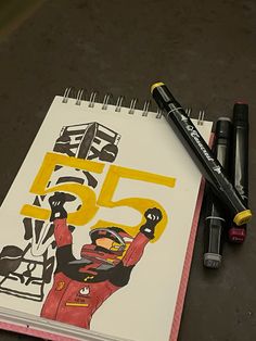 a notepad with a drawing of a man holding a fist and the number 55 on it